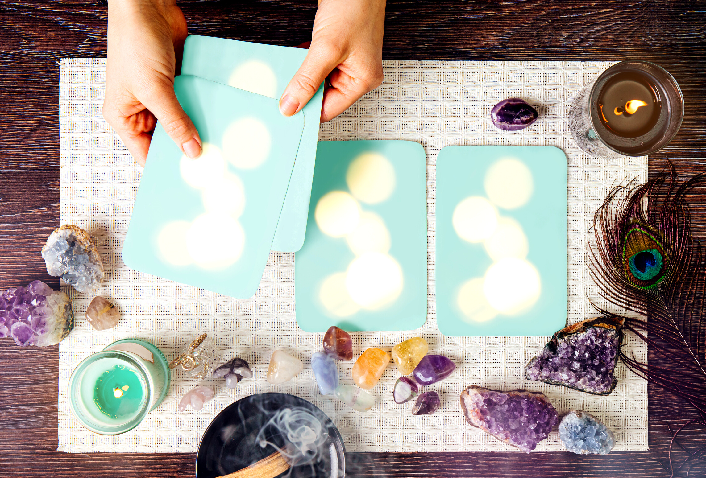 Woman do readings with homemade divination Angel cards.